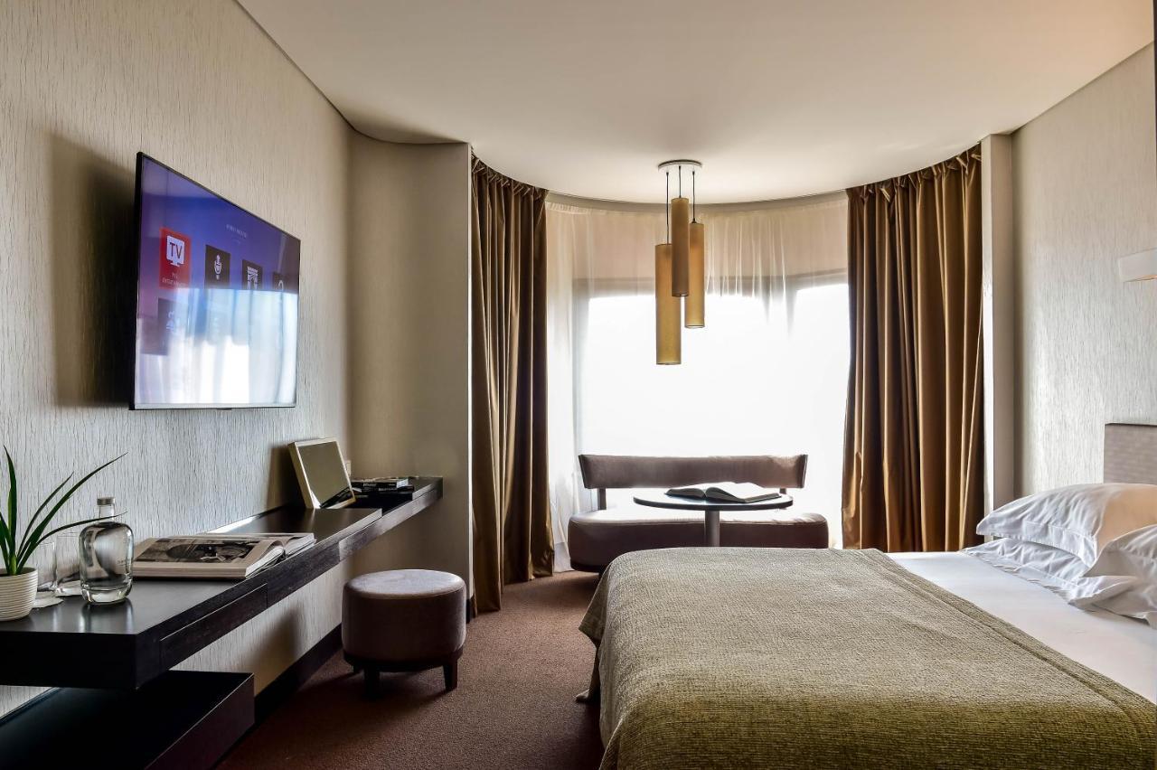 Porto Palacio Hotel By The Editory ภายนอก รูปภาพ A room at the hotel