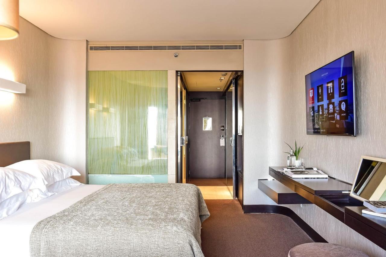 Porto Palacio Hotel By The Editory ภายนอก รูปภาพ A room at the hotel
