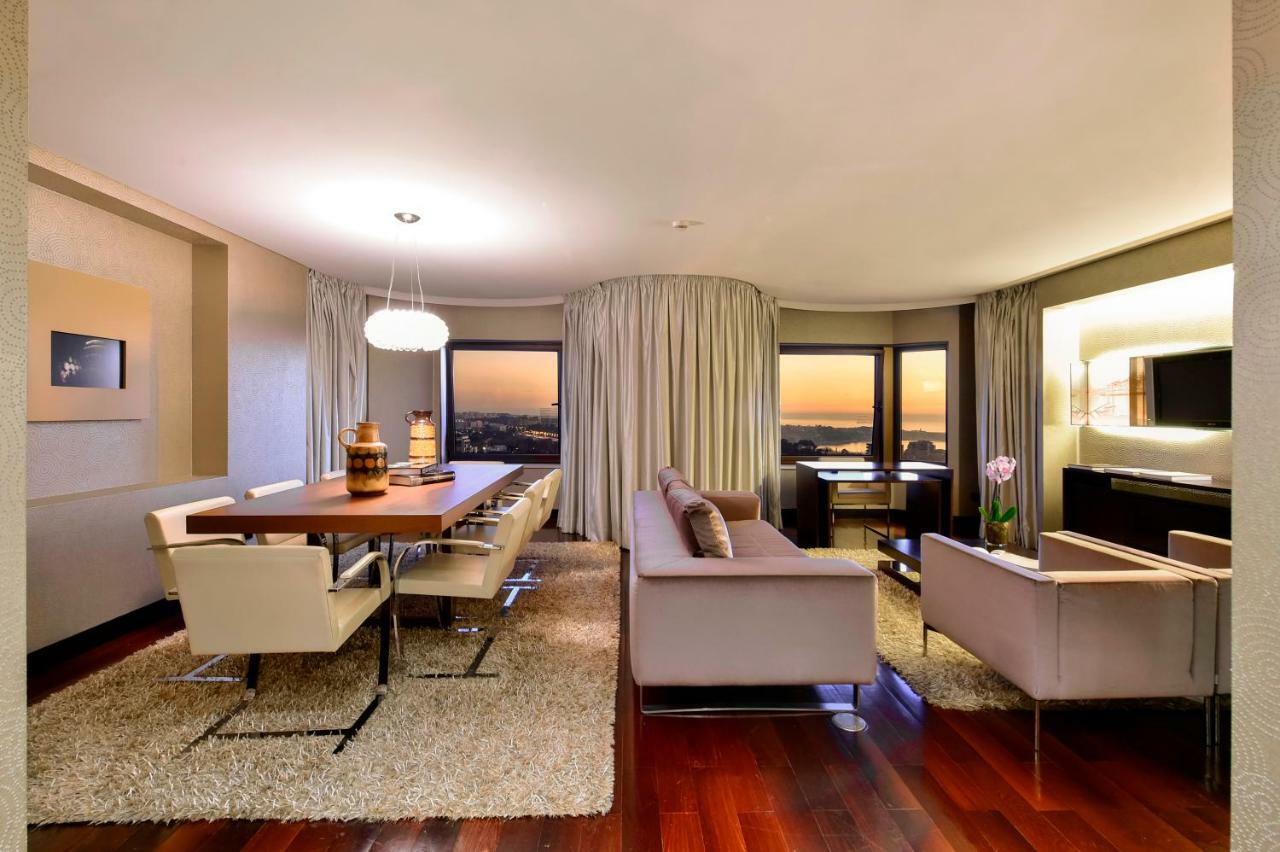 Porto Palacio Hotel By The Editory ภายนอก รูปภาพ A living room in a hotel