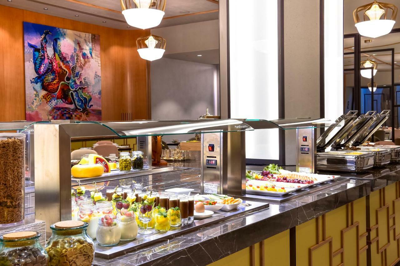 Porto Palacio Hotel By The Editory ภายนอก รูปภาพ A buffet at a hotel
